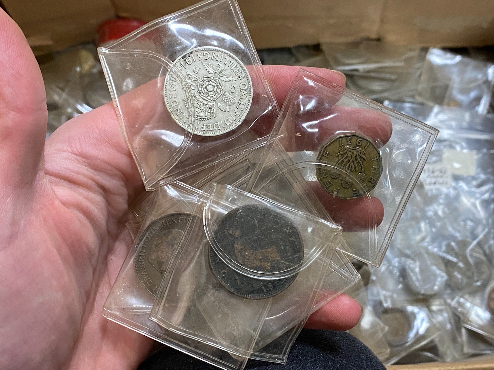 A box of assorted coins, mostly George V to QEII